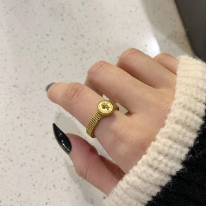French vintage gold coin ring with mesh chain band and queen portrait relief