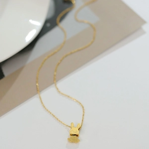 Mignon collier pendentif lapin mécanique doré en acier inoxydable pour femmes chic