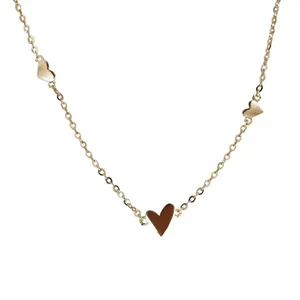 Minimalist gold plated titanium steel chain bracelet with three small heart charms for women