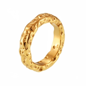 Gold stainless steel ring with irregular lava texture and polished inner surface