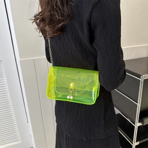 Sac bandoulière en PVC transparent vert néon avec chaîne dorée et boucle à perles