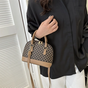 Retro brown shell shoulder bag with geometric pattern and gold zippers for women