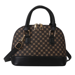 Elegante schelpvormige handtas met klaverpatroon en zwarte rand, handtas en crossbody stijl