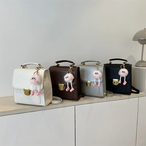 Chic multi-way mini flap backpacks in four colors with cute plush pendants for women