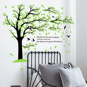 Modern wall sticker featuring a green tree with birds and English quote for bedroom decor