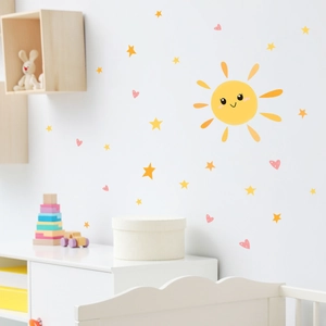 Cartoon smiling sun with yellow stars and pink hearts wall decal for nursery room decor