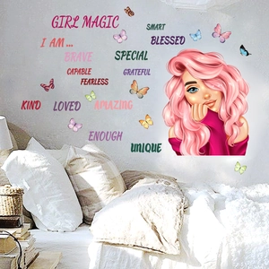 Detail of inspirational girl magic wall stickers with butterflies on bedroom wall