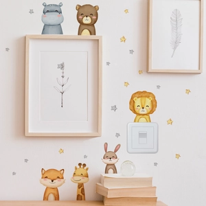 Nursery wall decals featuring cartoon animals like lions and giraffes in watercolor style