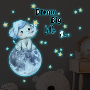 Luminous wall sticker detail showing glowing elephant on moon with Dream Big Little One text