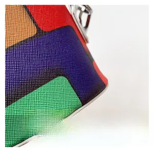 Macro shot of colorful Saffiano texture leather with premium silver metal hardware detail