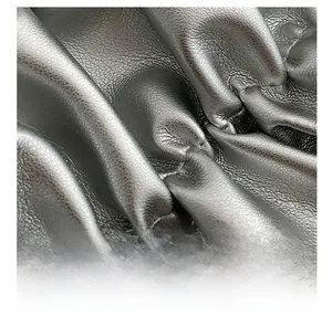 Macro shot of premium black pleated leather texture and detailed sewing craftsmanship