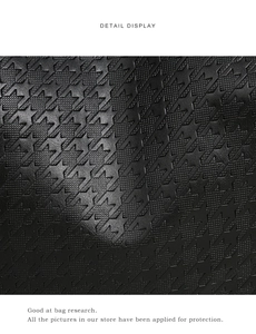Gros plan d'un sac cabas en cuir noir avec un motif pied-de-poule gaufré chic
