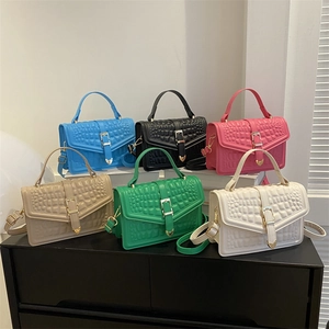 Crocodile pattern handbags in six colors with top handles and gold hardware