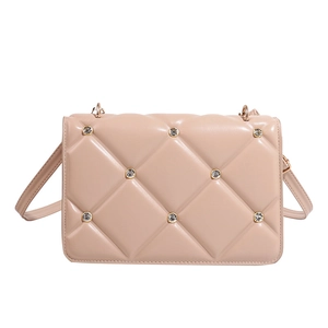 Pale pink quilted crossbody bag with rhinestone accents and gold-tone hardware detail