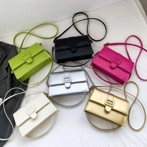 Minimalist patent leather crossbody square bags shown in six vibrant assorted colors