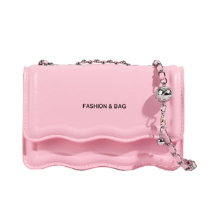 Pink PU leather crossbody bag with wavy flap design and silver chain ball detail