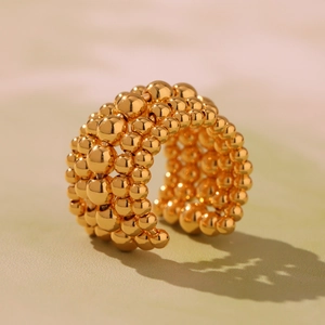 Chunky gold multi-layer beaded open ring with high-polished stacked metallic spheres
