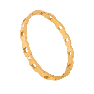 Brazalete de titanio chapado en oro de 18K con patrones geométricos y circonitas brillantes