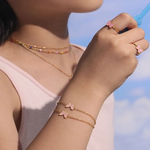 Pink butterfly jewelry set for kids with colorful beaded necklace bracelets and rings