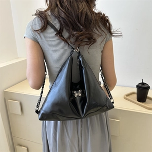 Versatile black PU leather shoulder bag with silver butterfly and metal chain strap