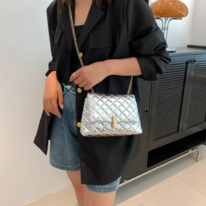Chic silver quilted chain crossbody bag for women shown as a stylish shoulder bag style