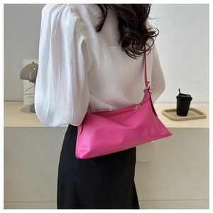 Detailed back view of a pink soft PU leather crossbody bag with minimalist styling