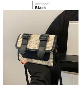Detail of beige woven fabric texture and black leather trim on a vintage crossbody bag
