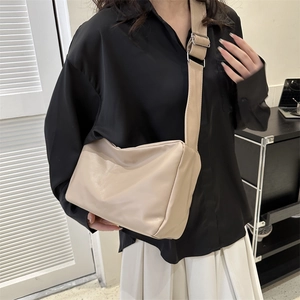 Chic beige soft PU leather crossbody bag with adjustable wide shoulder strap for women