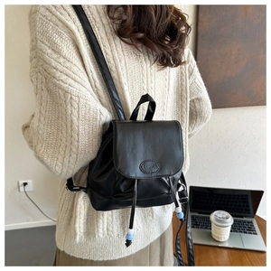 Mini sac à dos en cuir PU noir avec cordon de serrage et détail embossé tendance