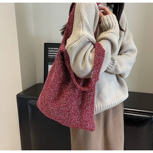 Red sequined knit tote bag with gold thread texture paired with autumn knitwear outfit