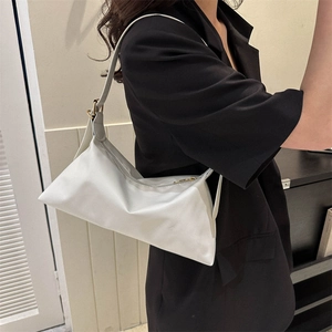 Minimalist white PU leather shoulder bag with gold zipper for women's fashion outfits
