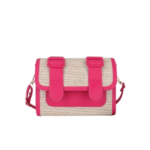 Mini straw woven crossbody bag in rose pink and natural beige with retro satchel buckles