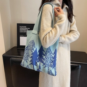 Light blue knitted tote bag with forest tree jacquard pattern for winter fashion