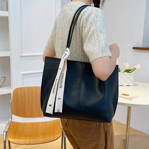 Large black PU leather tote bag with silk scarf on shoulder strap for women