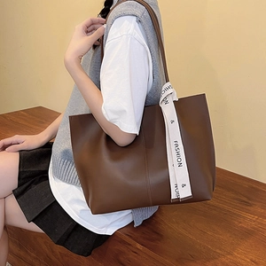 Vintage dark brown large tote bag with a stylish wide webbing strap for women's daily commute