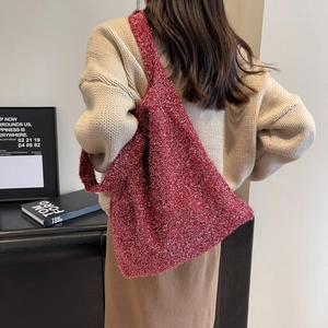 Elegant red shimmer knit shoulder bag for women with minimalist triangle tote silhouette