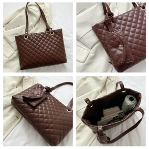 Detail view of brown quilted tote bag with diamond stitching and mini zipper pouch