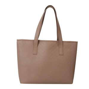 Minimalist earth tone quilted tote bag with V-shaped stitching and long shoulder straps