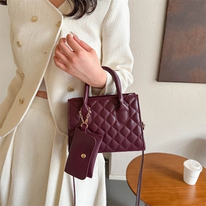 Quilted burgundy handbag set with mini pouch and adjustable strap for women