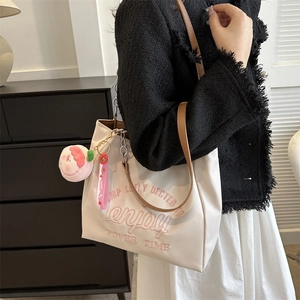 Retro cream canvas tote bag with pink embroidery and peach charm for women