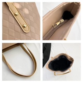 Macro shot of quilted texture and gold rivet details on beige faux leather tote bag
