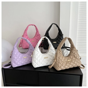 Detailed display of five colorful quilted hobo bags with metallic hardware and PU leather