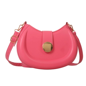 Pink crescent saddle bag with gold hardware buckle and adjustable leather strap