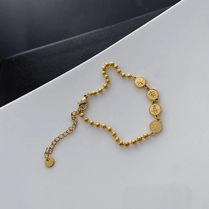 Bracelet minimaliste en acier titane doré avec caractères chinois de paix et joie