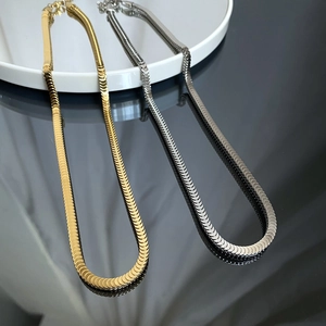 Sleek gold and silver fish scale snake chains in polished stainless steel for women
