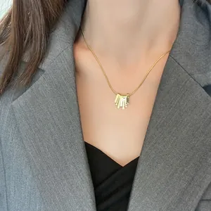 Elegant gold snake chain necklace with minimalist vertical sunburst pendant for women