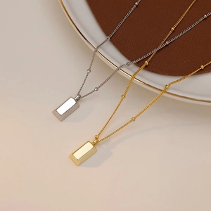 Minimalist geometric bar pendant necklaces in gold and silver with beaded chain