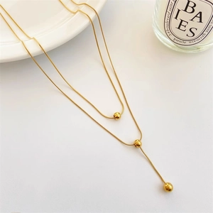Double layered gold titanium steel snake chain necklace with three polished round beads