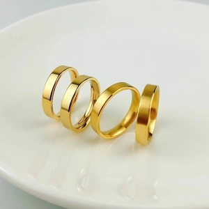 Polished and brushed 18K gold plated titanium steel rings for men and women