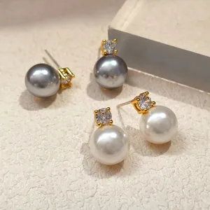 French style pearl stud earrings set with sparkling zircon in elegant gold setting